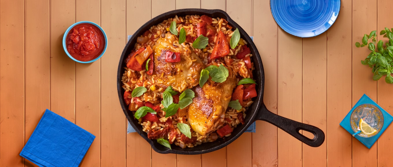A chicken and tomato with basil and rice skillet recipe made in less than an hour with a stovetop, microwave, and oven.