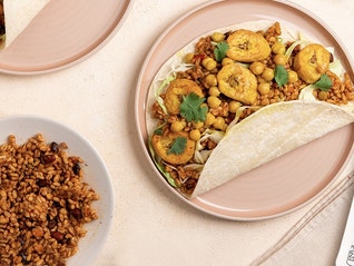 Ben's 10 Medley rice package - Caribbean Style flavor - on table next to plates of Caribbean Style Wraps